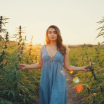 Person relaxing on an Atlanta balcony at sunset with preroll, THCA flower, and CBD gummies Caption: Same-day cannabis delivery in Atlanta from Oil & Eve