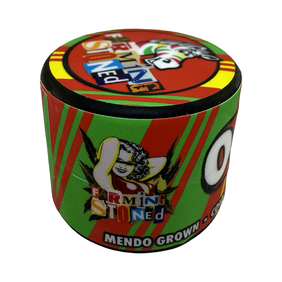 OG Zebra Cold Cure Hash Rosin jar with rear tri-color label and Farming Stoned pin-up branding.