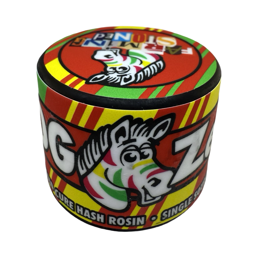 OG Zebra Cold Cure Hash Rosin jar by Farming Stoned with rainbow zebra artwork and bold red, green, and yellow label.