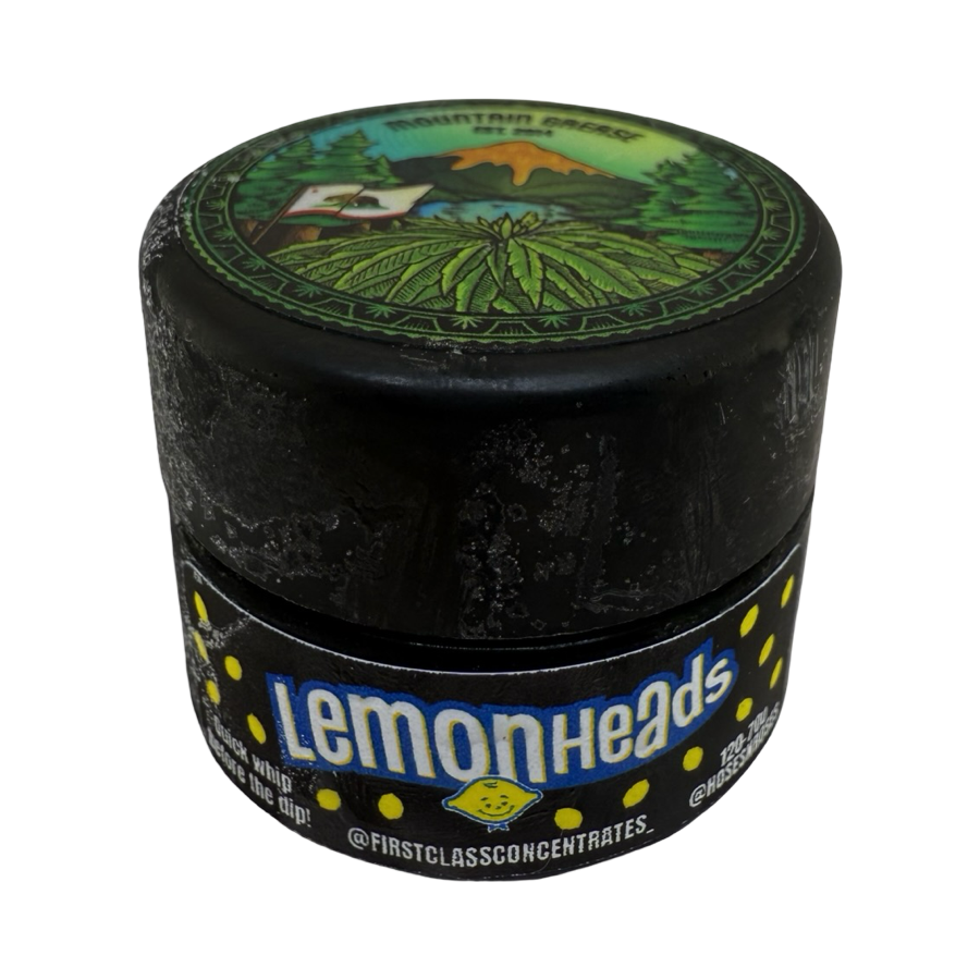 Lemonheads Cold Cure rosin jar by Mountain Grease × First Class Concentrates with black and yellow citrus-style artwork.